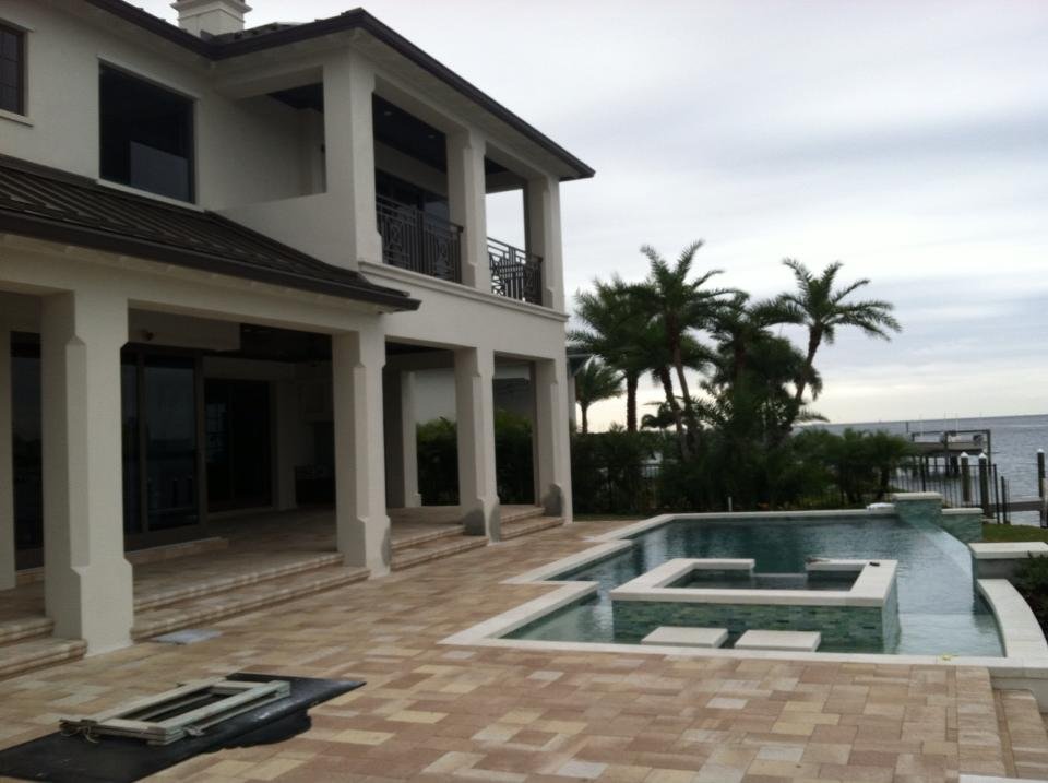 Two-story home with covered patio and pool